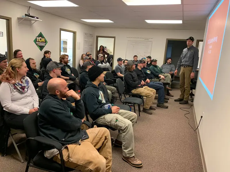 TCM Restoration technicians in a classroom training session